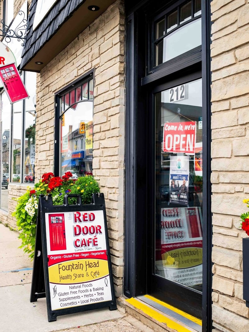 Red Door Café entrance with flower boxes, Fergus
