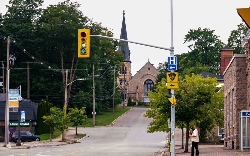 Street intersection with church steeple, Fergus