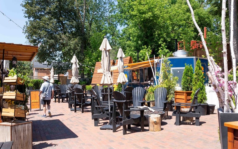 Sunny outdoor patio with Adirondack chairs
