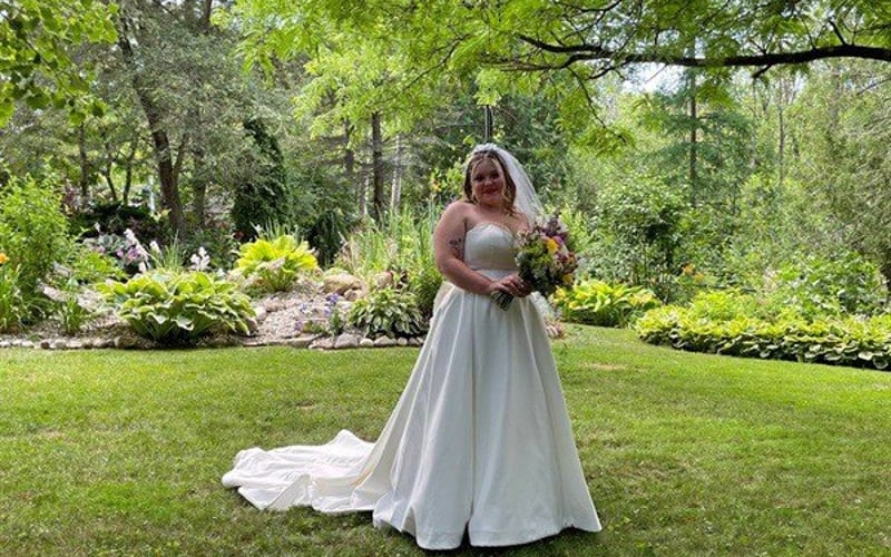 Bride in the garden with coneflowers