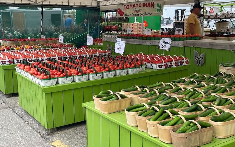 Tomato Man produce stall with tomatoes and cucumbers