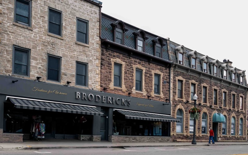 Broderick's clothing store in dark stone block, Fergus